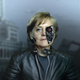 Image for article titled Why Is Angela Merkel Always Palling Around With Robots?